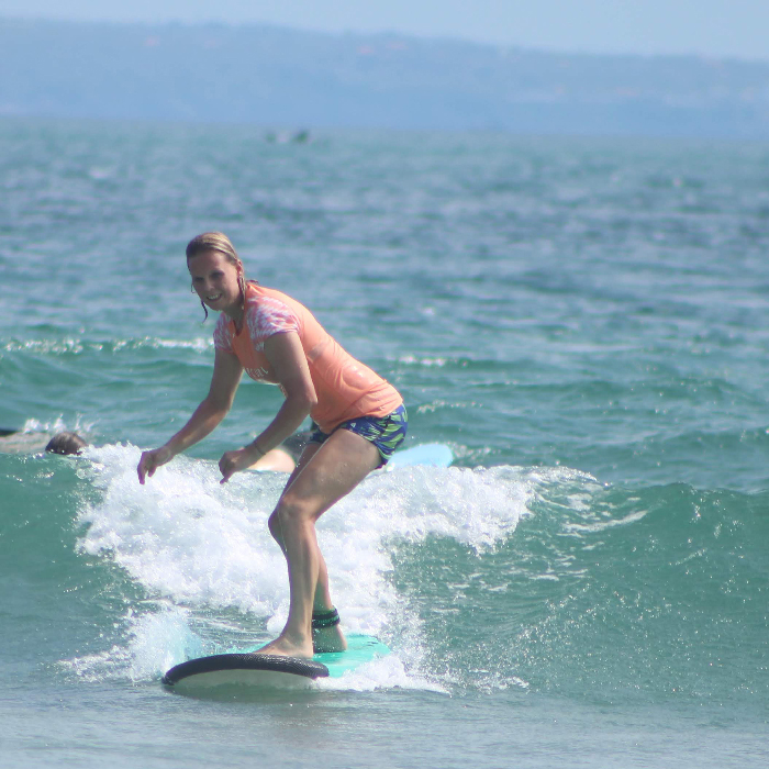 Sarah Cole surfing